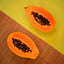 Fresh papaya slices showcasing papaya enzymes for natural skin exfoliation and glow